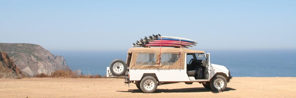 4x4 with Surfboards on desert island. While nothing to do with our Digital Marketing Agency in Nottingham, we like the car